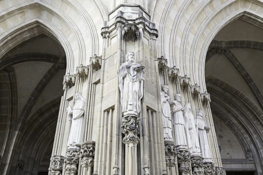 Stone statues in a church, detail of religious art in a monument