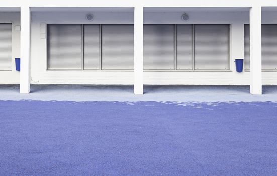 Park with blue floor and wall detail of an empty infantill park city urban detail