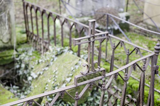 Cross on a grave, detail in the city