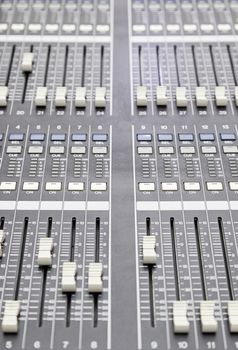 Detail of a concert mixer, mixer to control the volume and music, exploration and entertainment