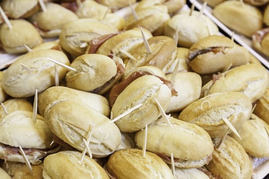 Bread sandwiches with ham, detail of an appetizer in a restaurant, food healthy lifestyle