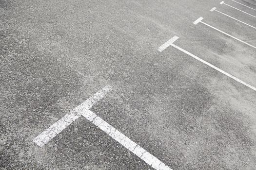 Lines on the asphalt of a parking, detail of a lines