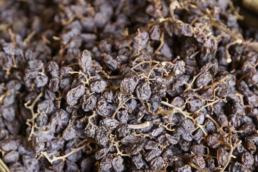 Raisins dried in a market, a detail of raisins, food healthy lifestyle