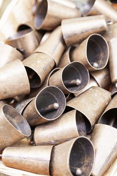 Metal cow bells, detail of some instruments to produce sounds, Local handicrafts