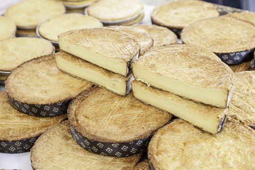 Typical Spanish cream homemade pie, a sweet dessert detail of artisan food in a street market