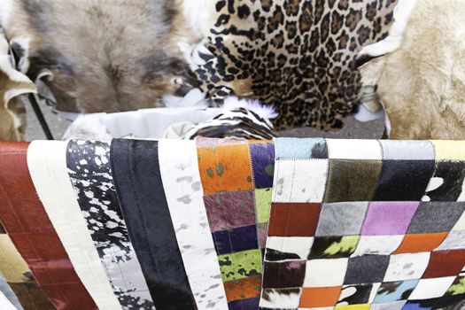 Animal skins color, detail of furs in an old market