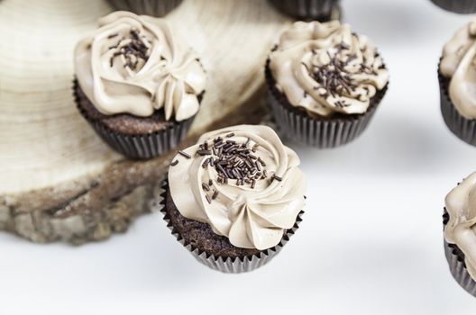 Sweet cupcakes decorated dessert detail flavors, colors and decoration, party and celebration