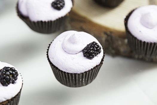 Sweet cupcakes decorated dessert detail flavors, colors and decoration, party and celebration