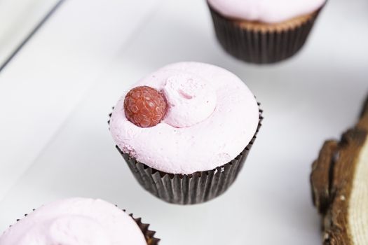 Sweet cupcakes decorated dessert detail flavors, colors and decoration, party and celebration