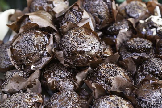 Homemade chocolate cupcakes, detail of a sweet dessert, traditional pastries