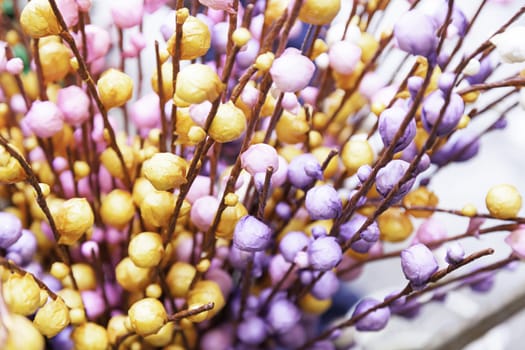 Flowers colored cotton, detail of a flower made with cotton and painted decoration