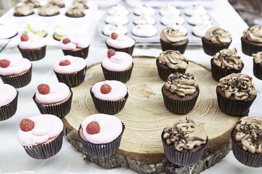 Sweet cupcakes decorated dessert detail flavors, colors and decoration, party and celebration