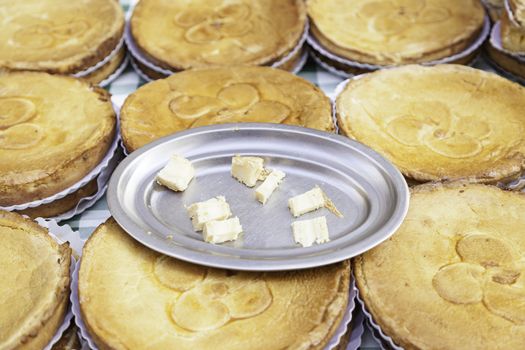 Typical Spanish cream homemade pie, a sweet dessert detail of artisan food in a street market