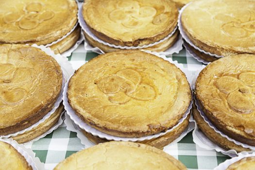 Typical Spanish cream homemade pie, a sweet dessert detail of artisan food in a street market