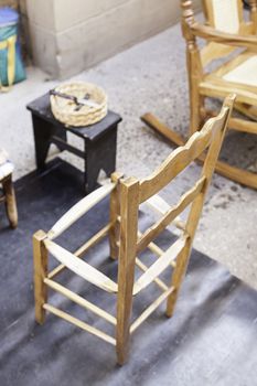 Manufacture of wooden chairs, detail of a factory of outdoor chairs, traditional Spanish art
