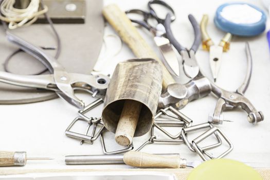 Making a metal cowbell, detail of a metal instrument, farm tools