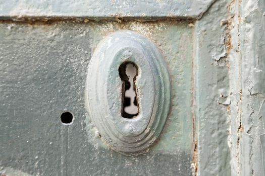 Old rusty lock, detail of an old abandoned city, textured background, rust and mold door