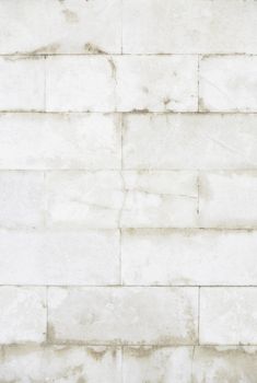 Textured marble background, detail of a wall decorated with stone