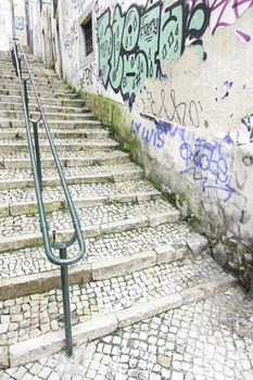 Stairs in Alfama district, Lisbon, detail of a old sclera in a typical neighborhood