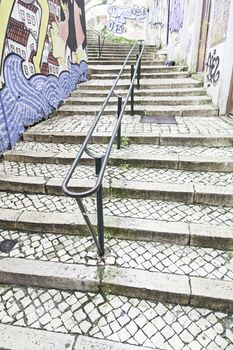 Stairs in Alfama district, Lisbon, detail of a old sclera in a typical neighborhood