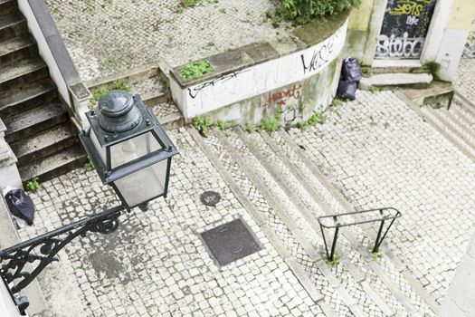 Stairs in Alfama district, Lisbon, detail of a old sclera in a typical neighborhood