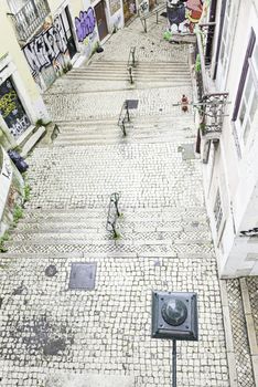 Stairs in Alfama district, Lisbon, detail of a old sclera in a typical neighborhood