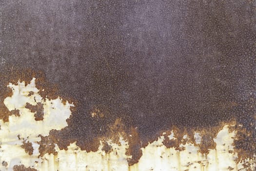 Rusty metal wall, detail of an old wall abandoned and battered