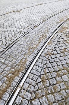 Tram tracks on a street in Lisbon, detail of a route for public transport in the city