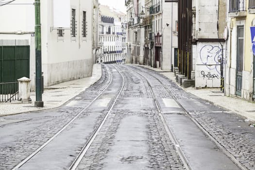Old street of Lisbon, detail of an old area of ??the city, to tram routes in Portugal