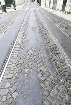Old street of Lisbon, detail of an old area of the city, to tram routes in Portugal