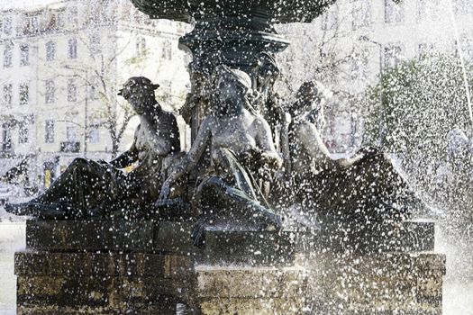 Typical Source of Lisbon, detail of an ancient monument with water, decoration in the city