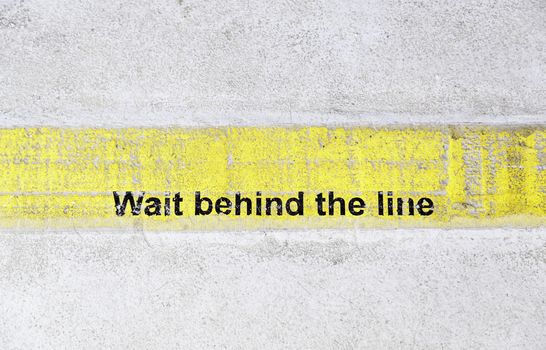 Wait behind the line, a signal detail and safety information