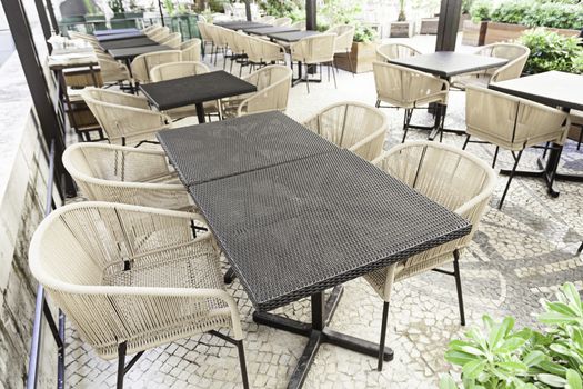 Terrace of a bar in the street, a detailed tables and chairs of a bar