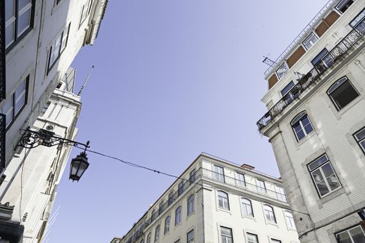 Streets of Lisbon typical cable tram, detail of the streets of Lisbon, tourism in the city