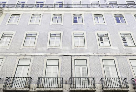 Typical facade tiles in Lisbon, facade detail of an ancient decorated