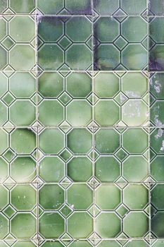 Lisbon typical green tiles detail of a typical wall decoration in Portugal