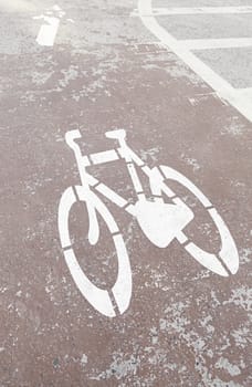 Bicycle sign on asphalt, detail of a signal information for cyclists, traffic signal