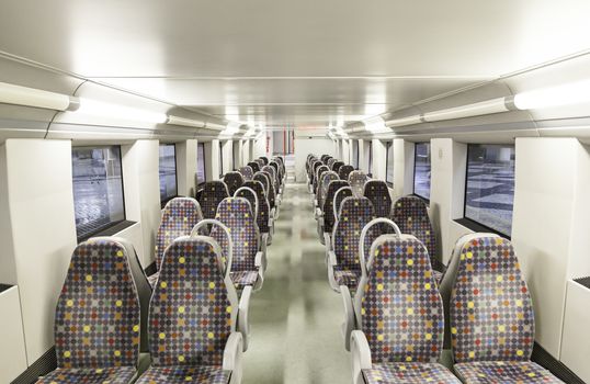 Seats on a train, detail of a new public transport, modernity and progress