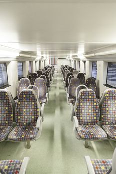 Seats on a train, detail of a new public transport, modernity and progress