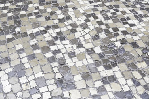 Typical stone floor Lisbon, detail of a typical floor with shapes and drawings, art Portugal, tourism
