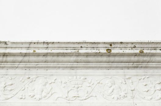 Cornice decorative stone detail of a wall decorated and carved