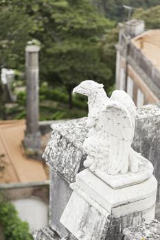 Old stone eagle, closeup of a figure in a monument in Sintra, Portugal