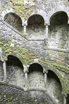 The Initiation well of Quinta da Regaleira in Sintra, Portugal. It's a 27 meter staircase that leads straight down underground and connects with other tunnels via underground walkways. 