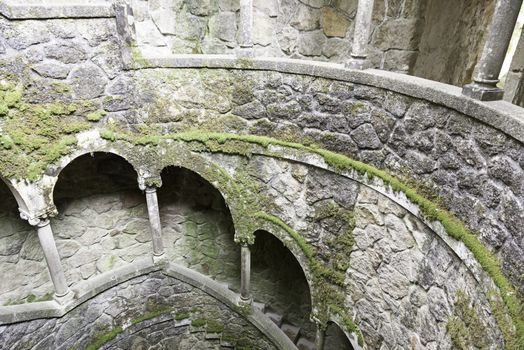 The Initiation well of Quinta da Regaleira in Sintra, Portugal. It's a 27 meter staircase that leads straight down underground and connects with other tunnels via underground walkways. 