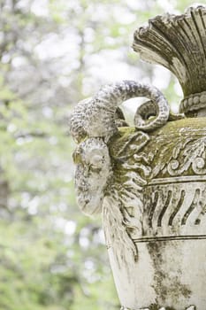 Vase with detail of a goat, old stone object, classical art