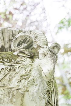 Vase with detail of a goat, old stone object, classical art