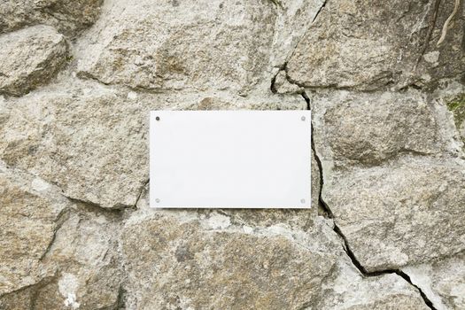 Stone wall with a blank, detail of space for text, background vacuum