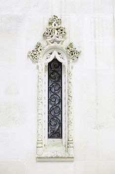 Old Manueline detail of a decorated window, window art and ancient monument
