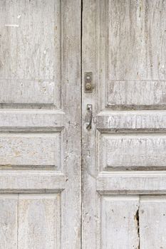 Old wooden door detail of a decorated wooden door, protection and decoration