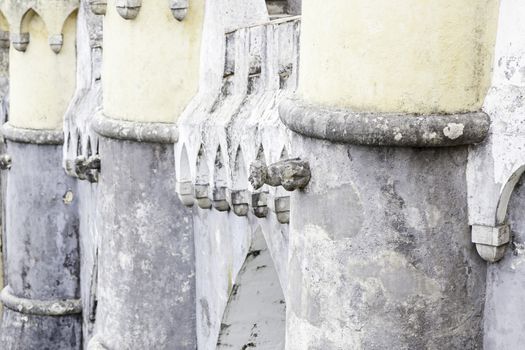 Gargoyle in Sintra Pena Palace, detail of an old heritage of humanity building, tourism in Portugal